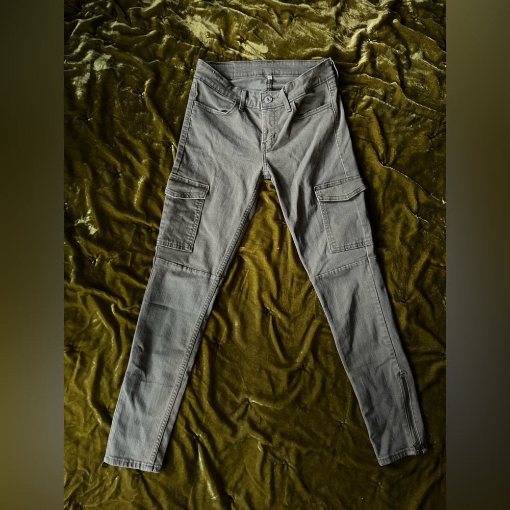 Army green Levi’s with cargo pockets.